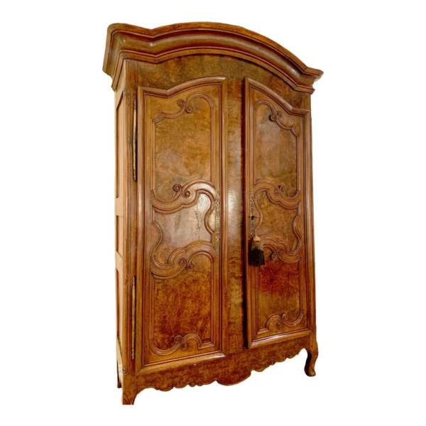 Antique Style Wooden Armoire with Intricate Carvings