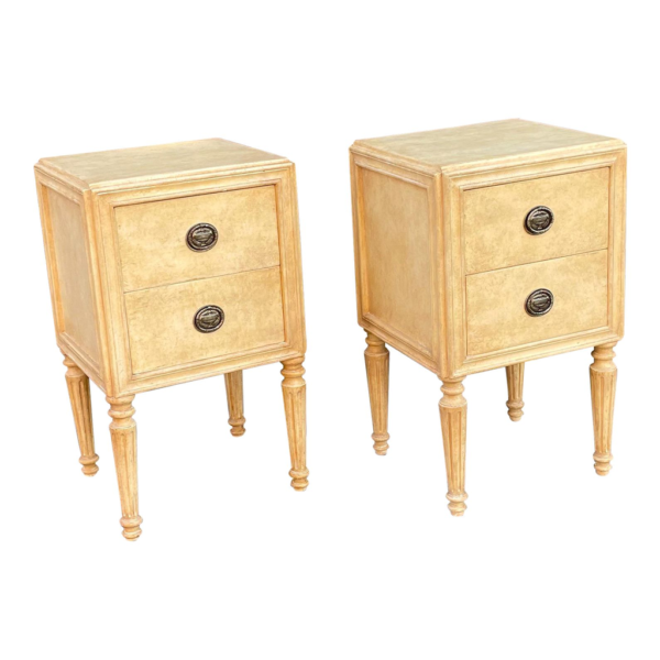 Beige wood bedside table with two drawers, mid-century design.
