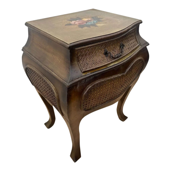 Brown wood nightstand with carved flower details