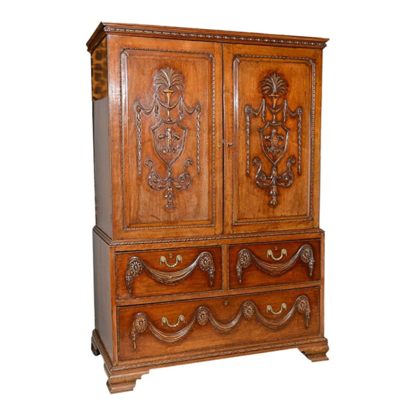Classic wooden armoire with carved details