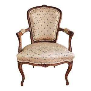 Classic beige and brown armchair sofa with carved wooden frame