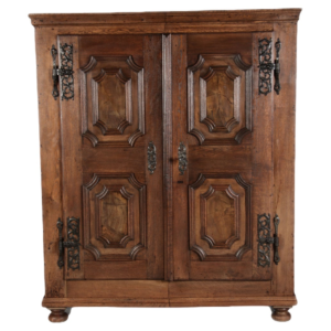 Classic Brown Wooden Armoire with Carved Details and Iron Hardware