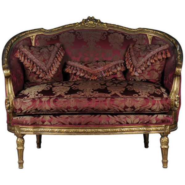 Burgundy and gold classic French style sofa with wood frame and intricate carvings