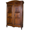 Elegant brown wooden wardrobe with classic French design.