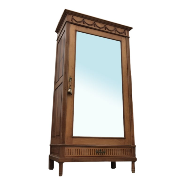 Vintage style wood wardrobe with carved details