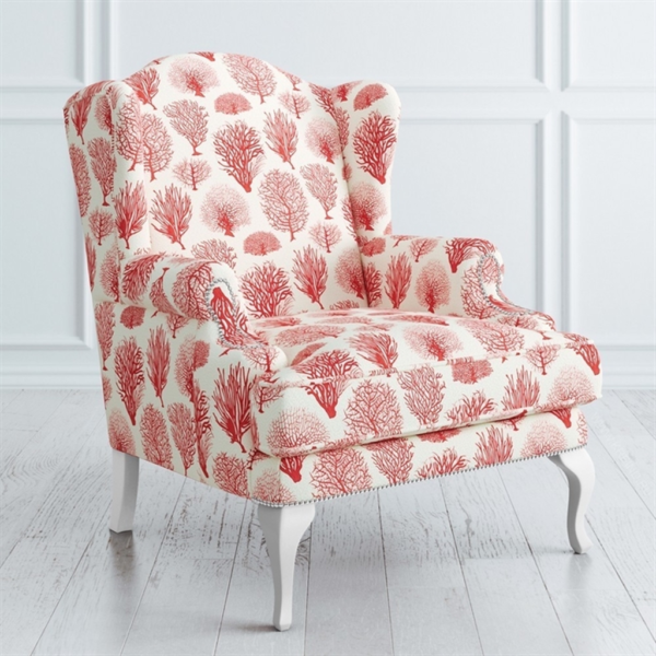 Elegant coral print wingback sofa
