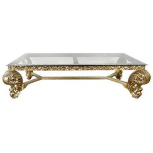 Baroque gold dining table with glass top.