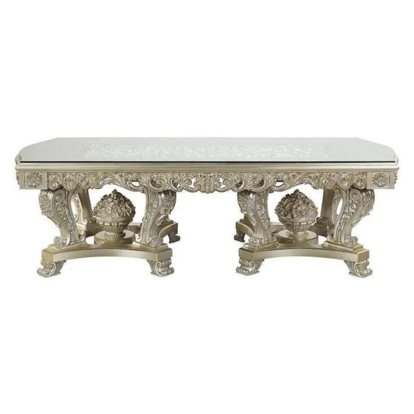 Classic beige carved wood dining table with glass top