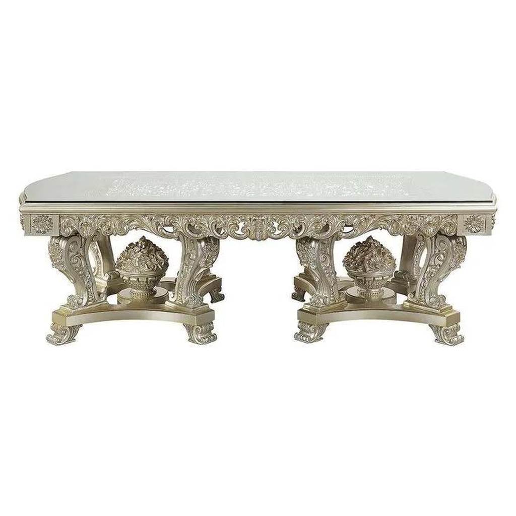 Classic beige carved wood dining table with glass top
