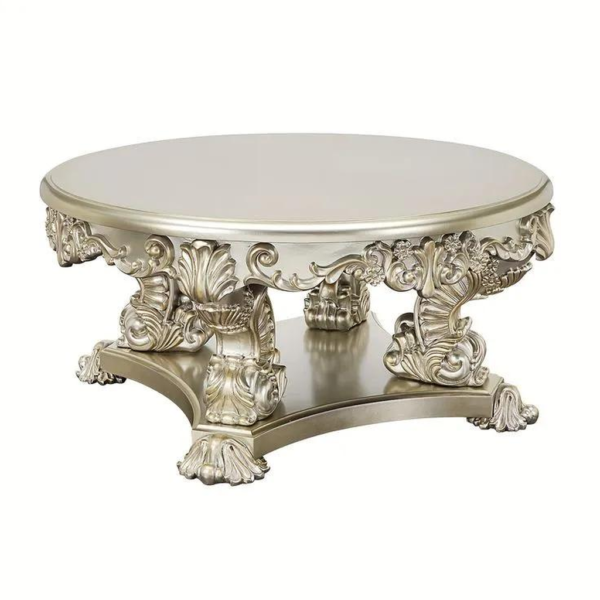 Vintage silver dining table with ornate carvings