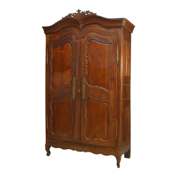 Classic French carved armoire with antique finish
