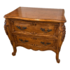 French Provincial style nightstand with brown wood and detailed carvings
