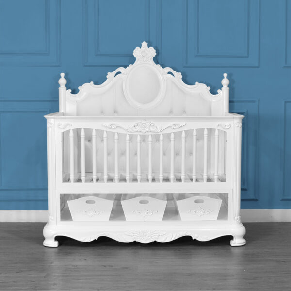 Handcarved from solid mahogany wood, this French-inspired baby cot combines timeless elegance with modern practicality. Featuring a plush white velvet tufted headboard, intricate floral carvings, and built-in storage drawers, it ensures durability, safety, and luxury for your nursery. The multifunctional design serves as both a crib and day bed, offering adjustability and mobility for babies