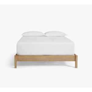 Mid-Century Modern bed with natural wood frame