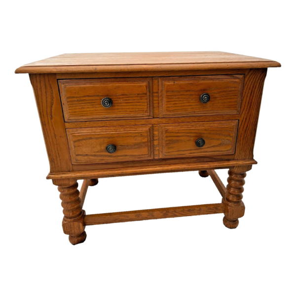 Mid-Century Modern bedside table with four drawers and natural wood finish