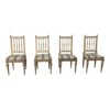 Mid-Century Modern wood frame dining chair set with striped fabric seat.