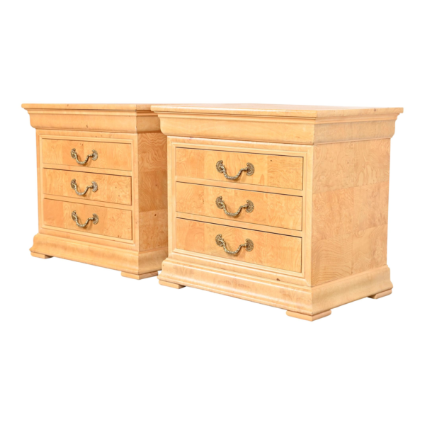 Mid-Century bedside table with three drawers and wood grain finish