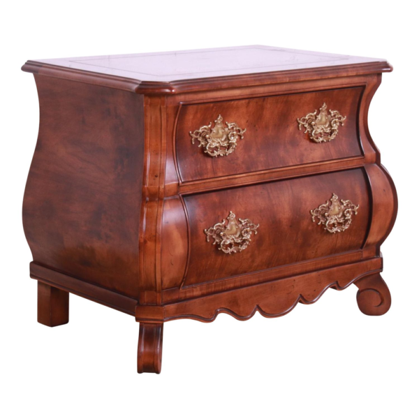 Queen Anne style wooden nightstand with brown finish