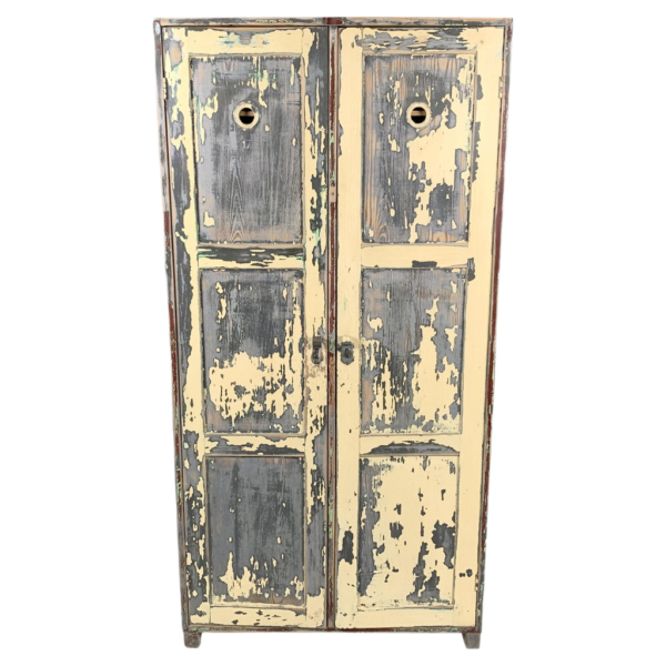 Rustic yellow and grey wooden wardrobe, antique design.