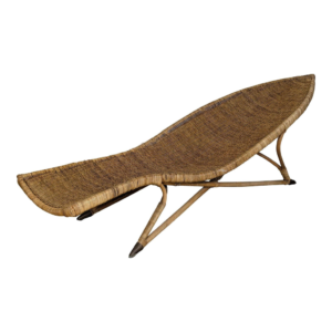 Handcrafted rattan chaise lounge, bohemian style sofa chair, woven relaxation furniture.