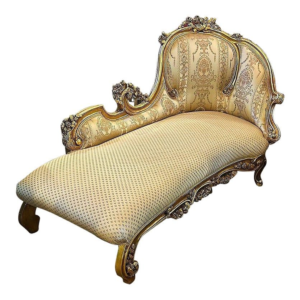 Ornate gold chaise lounge, cream damask fabric, classic style, elegant seating, luxury furniture.