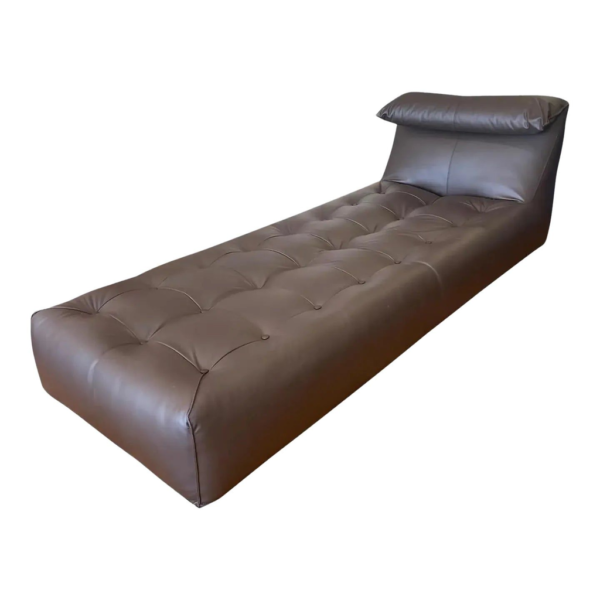 Modern brown leather chaise lounge sofa, tufted design, headrest pillow, contemporary seating, relaxation furniture