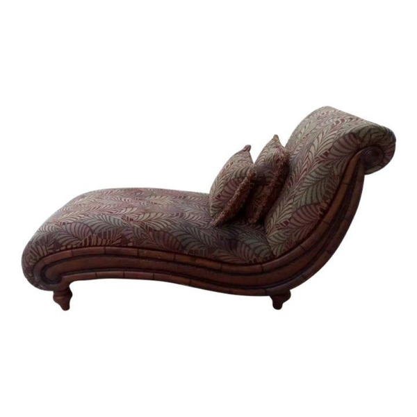 Classic chaise lounge with floral pattern, fabric upholstery, scroll arm design, wood frame.