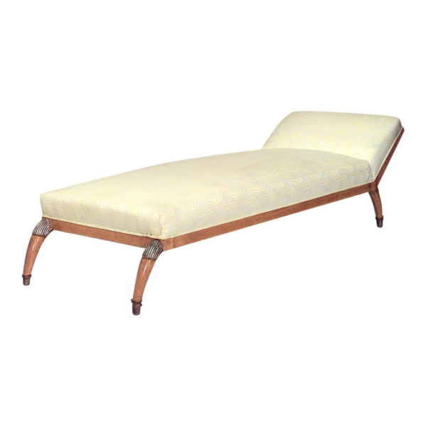 Patterned cream chaise lounge, classic wooden frame, upholstered seat, elegant lounge furniture