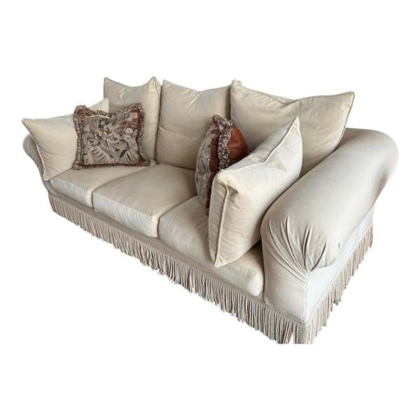 Cream sofa with fringe, classic style couch, elegant living room furniture, comfortable seating, high-quality sofa manufacturer.
