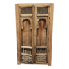 Rustic wooden armoire with carved details