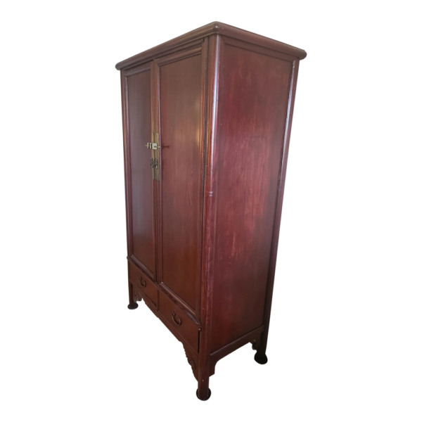 Classic dark red wood armoire with two doors and drawers, part of the Daabadi Furniture manufacturer collection.