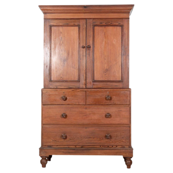 Classic brown wooden wardrobe with drawers and doors.