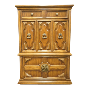 Classic brown wooden armoire with ornate carvings