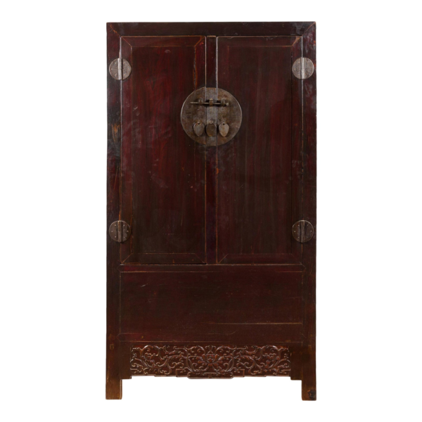 Classic dark brown wood armoire with iron hardware.