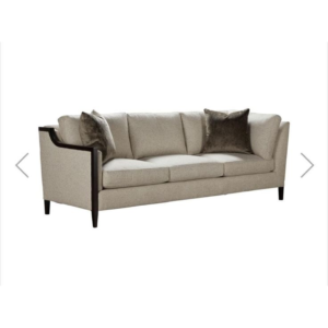 Beige sofa with plush cushions