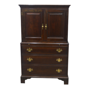 Classic dark brown wooden wardrobe with drawers and doors