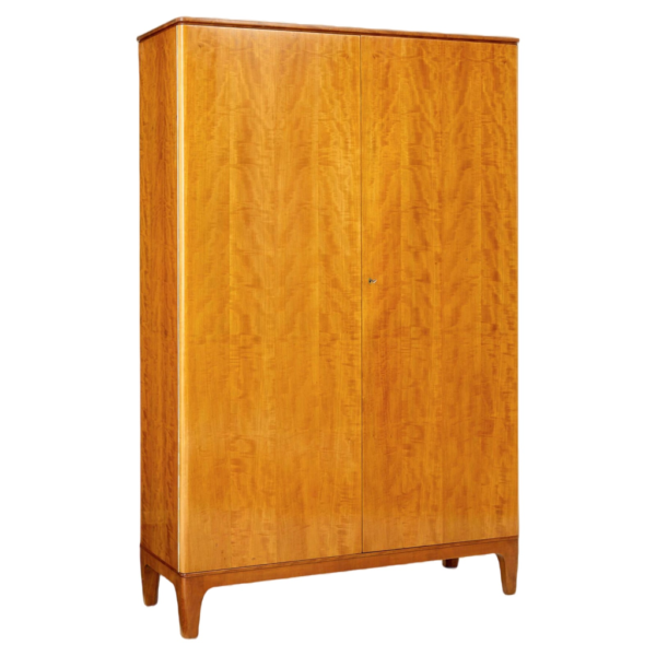Elegant wood wardrobe with classic design, perfect for bedroom storage.