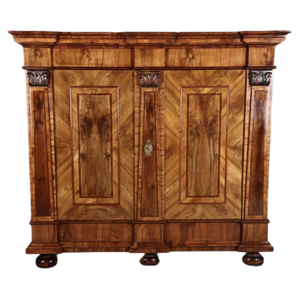 Classic brown wood wardrobe with intricate design