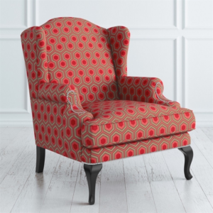 Red and beige geometric pattern wingback sofa