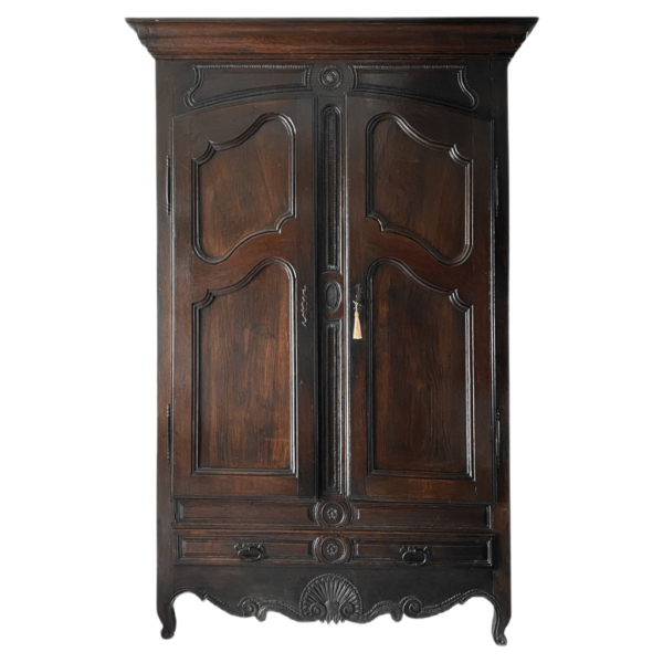 Classic Dark Brown Wood Armoire with Intricate Carvings