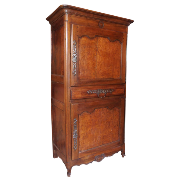 Vintage brown wooden armoire with iron hardware