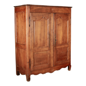 Vintage wooden armoire with intricate carvings