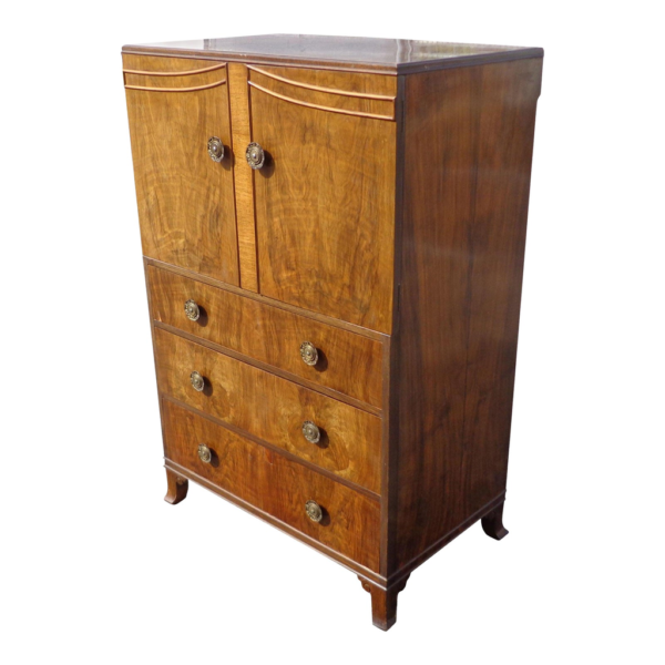 Vintage brown wooden armoire with multiple drawers and doors