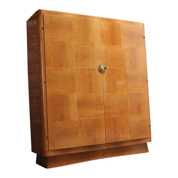 Vintage wooden armoire with brass hardware