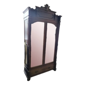 Vintage dark brown armoire with mirror doors and drawer.