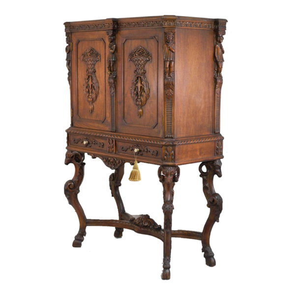 Vintage Carved Armoire with Intricate Wood Details