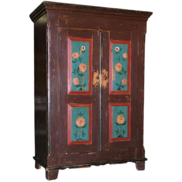 Vintage folk art armoire with hand-painted floral design.