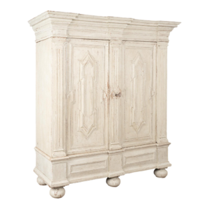 White vintage-style armoire with carved details