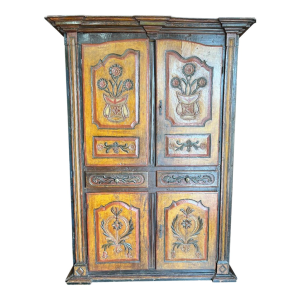 Vintage style armoire with floral carvings
