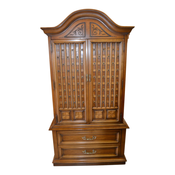 Vintage wood wardrobe with carved detailing